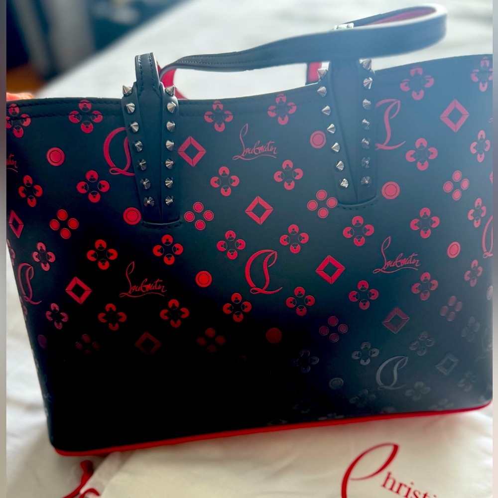 Christian Louboutin tote with wristlet never worn!